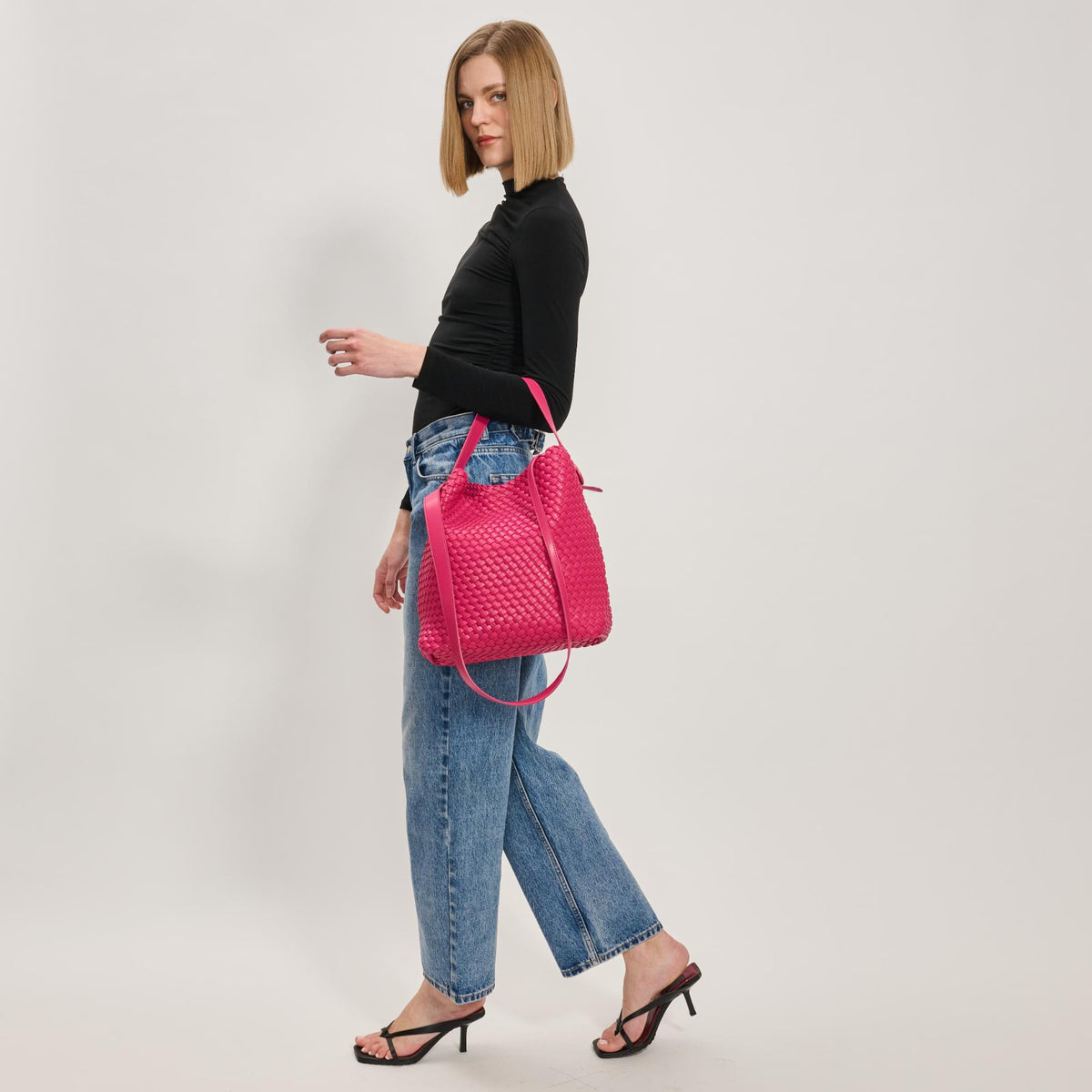 Woman wearing Fuchsia Moda Luxe Edith Hobo 842017137504 View 3 | Fuchsia