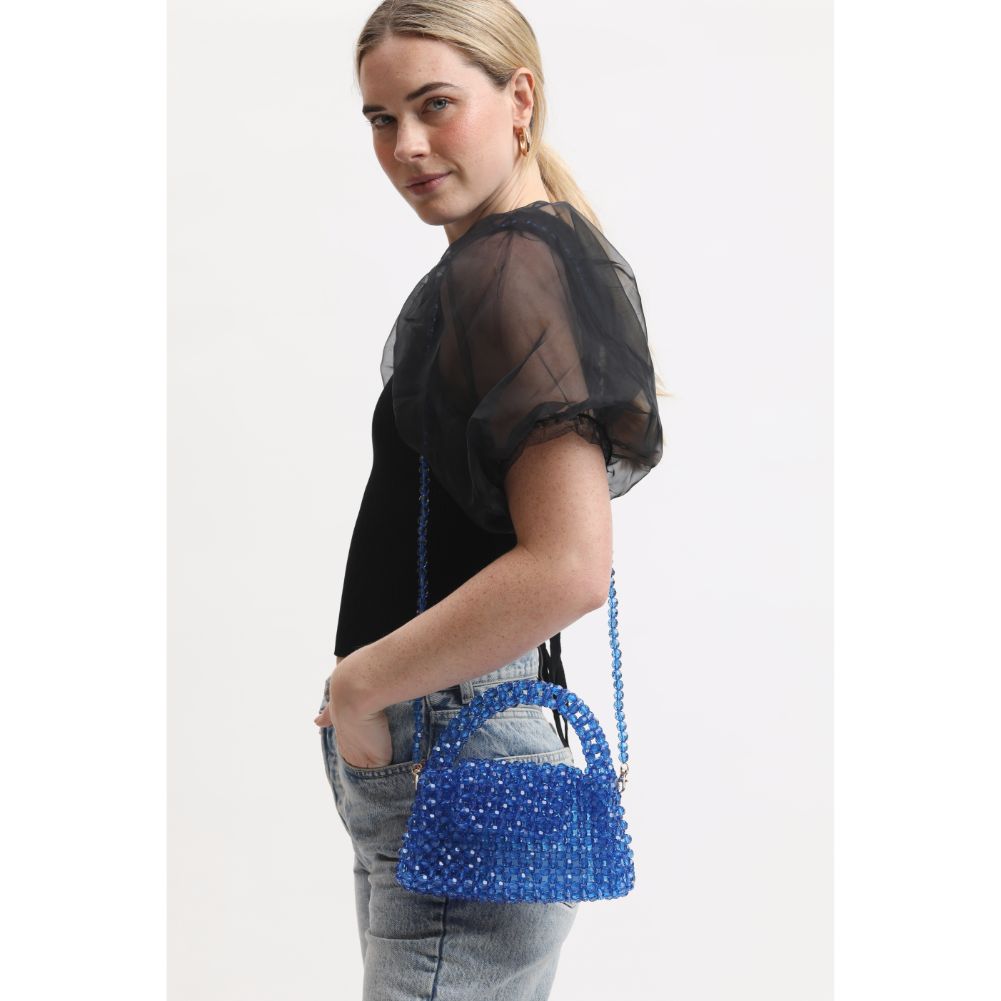 Woman wearing Blue Moda Luxe Dolly Evening Bag 842017133469 View 1 | Blue
