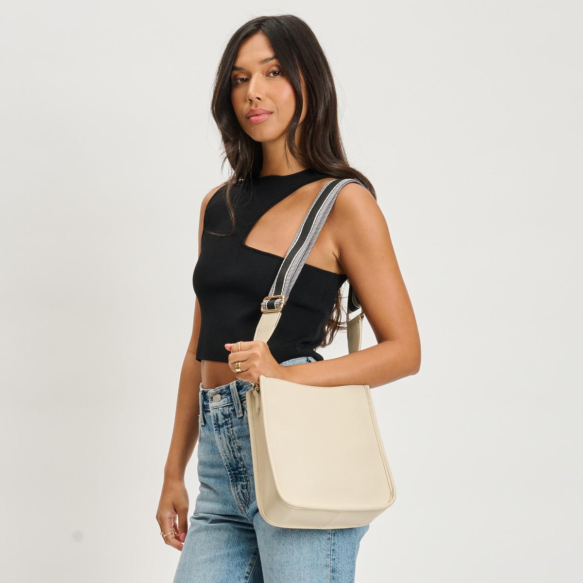 Woman wearing Ivory Moda Luxe Glitzia Crossbody 842017135159 View 3 | Ivory