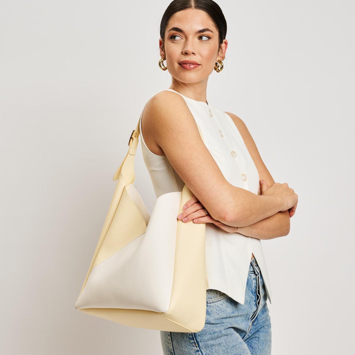 Woman wearing Ivory Butter Moda Luxe Frankie Hobo 842017138549 View 2 | Ivory Butter