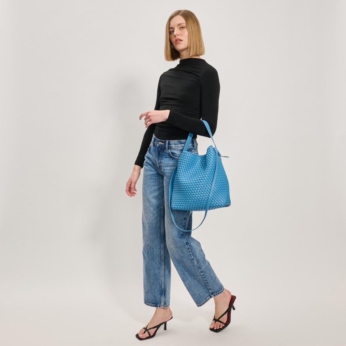 Woman wearing Denim Moda Luxe Edith Hobo 842017137498 View 3 | Denim