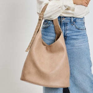 Woman wearing Natural Moda Luxe Jacqueline Hobo 842017136989 View 4 | Natural