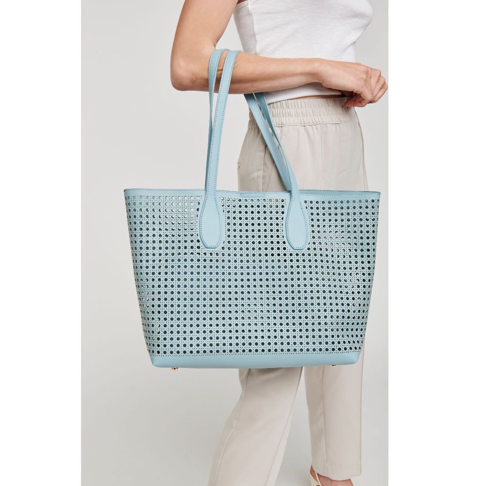 Woman wearing Eggshell Blue Moda Luxe Brazil Tote 842017124252 View 1 | Eggshell Blue