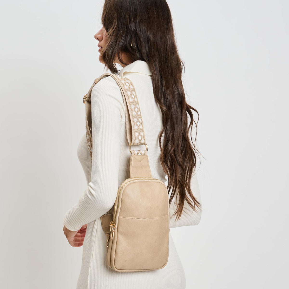 Woman wearing Natural Moda Luxe Zuri Sling Backpack 842017135852 View 3 | Natural