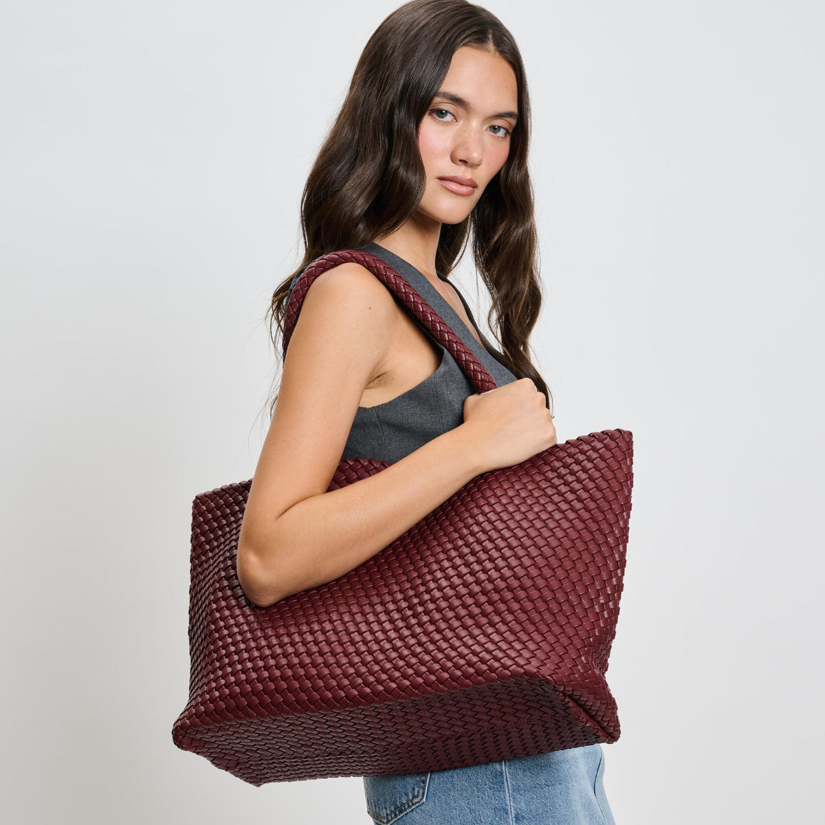 Woman wearing Burgundy Moda Luxe Solana Tote 842017135760 View 1 | Burgundy