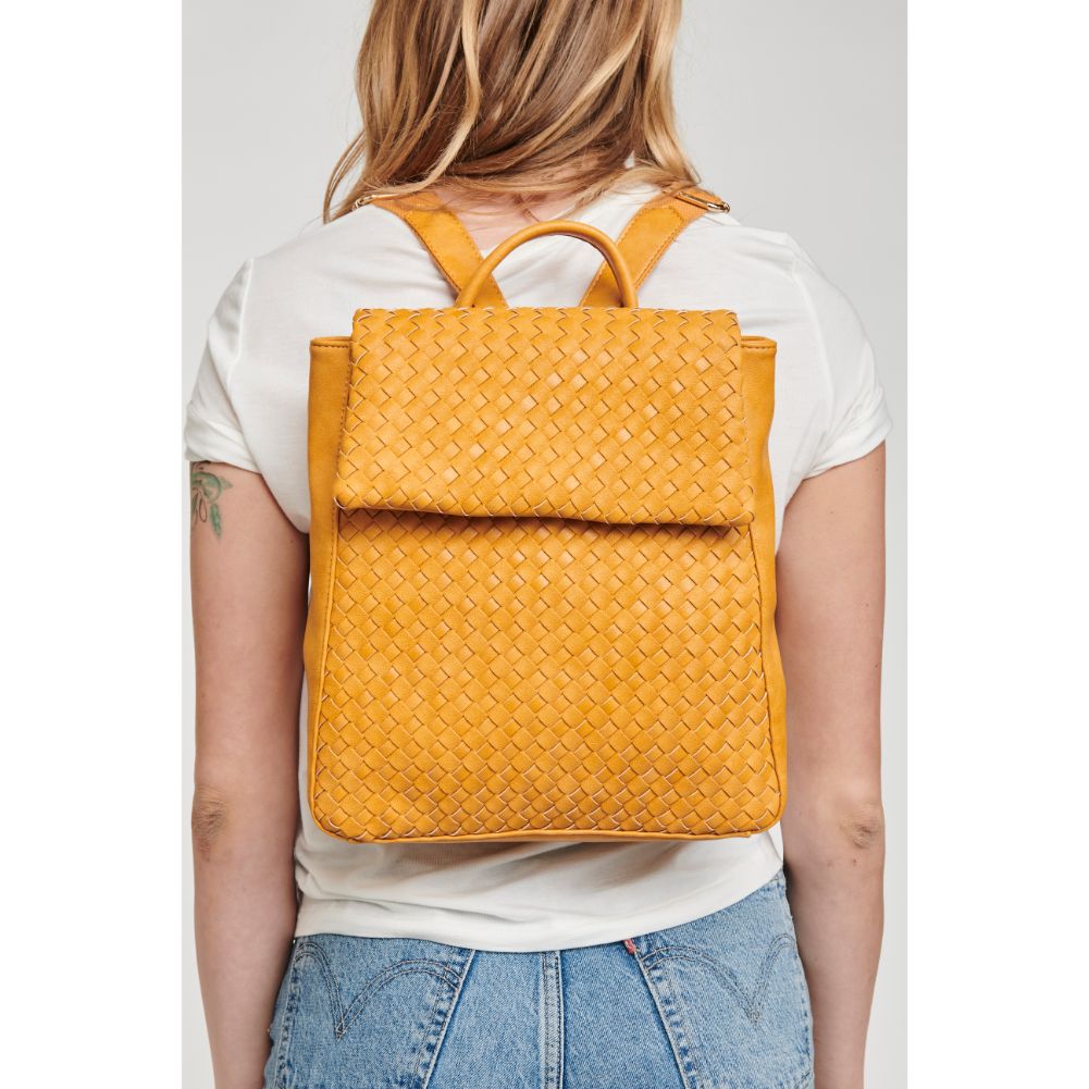 Woman wearing Mustard Moda Luxe Aurie Backpack 842017127284 View 1 | Mustard