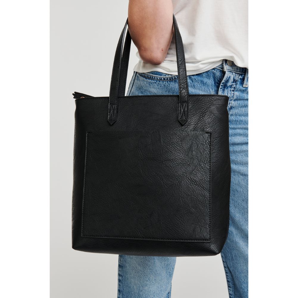 Woman wearing Black Moda Luxe Sadie Tote 842017126751 View 2 | Black