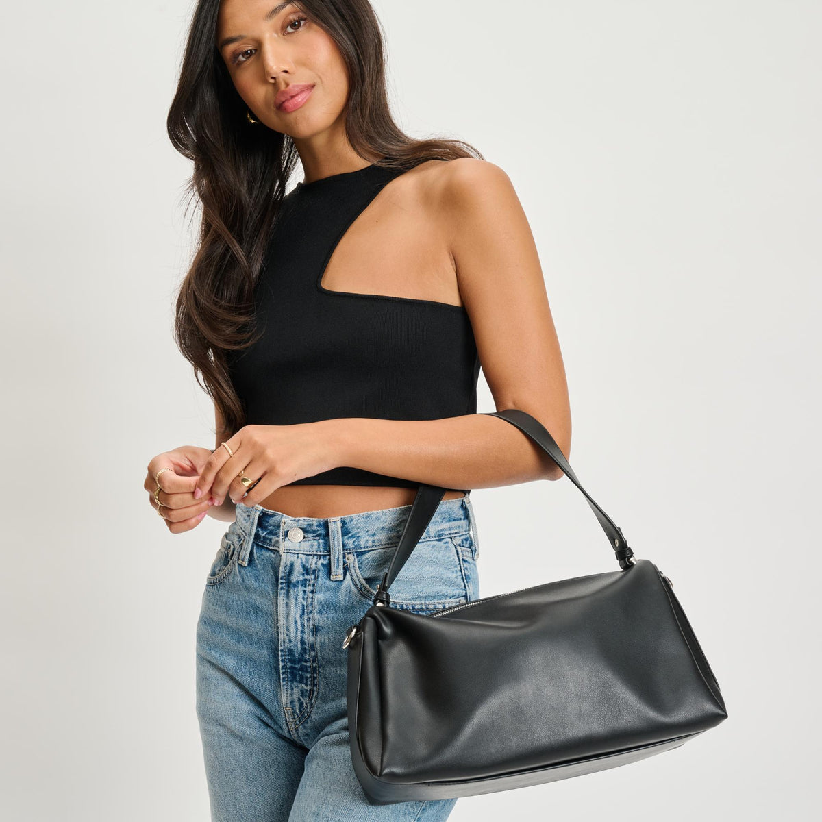 Woman wearing Black Moda Luxe Trendora Crossbody 842017134596 View 1 | Black