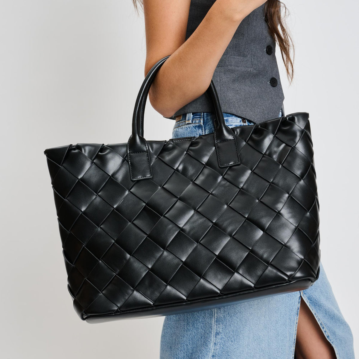 Woman wearing Black Moda Luxe Adeline Tote 842017135807 View 4 | Black