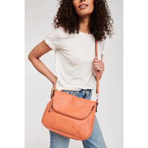 Woman wearing Salmon Moda Luxe Dandelion Crossbody 842017107125 View 1 | Salmon