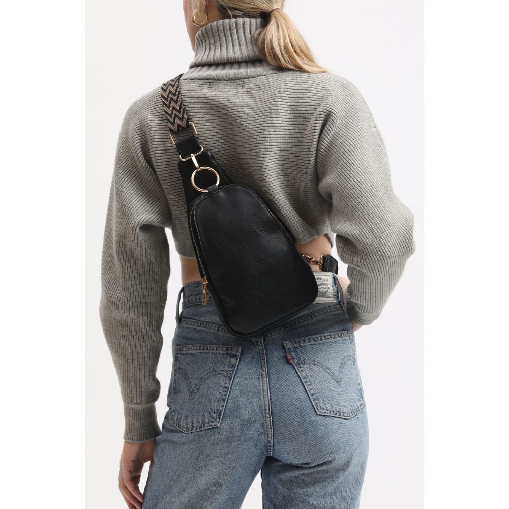 Woman wearing Black Moda Luxe Regina Sling Backpack 842017133322 View 3 | Black