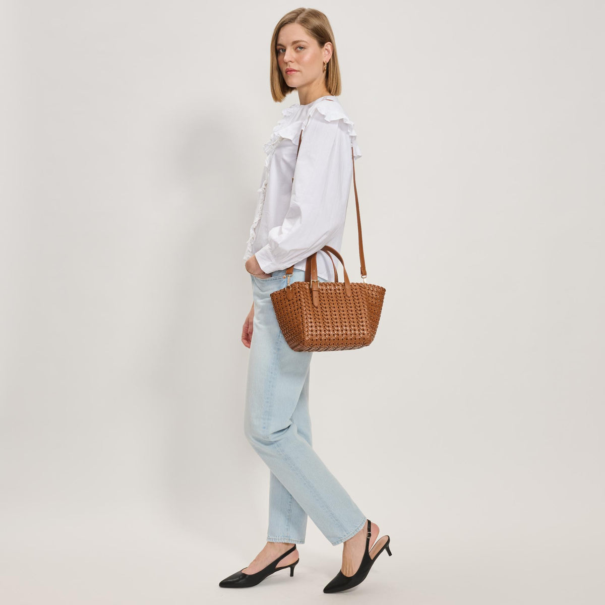 Woman wearing Café Moda Luxe Estelle Tote 842017137764 View 4 | Café