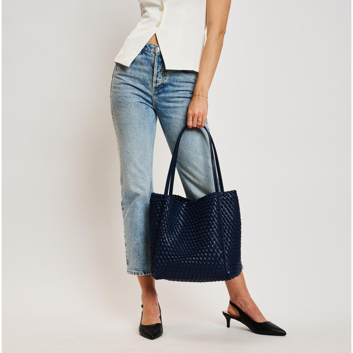 Woman wearing Navy Moda Luxe Gladys Tote 842017137276 View 2 | Navy