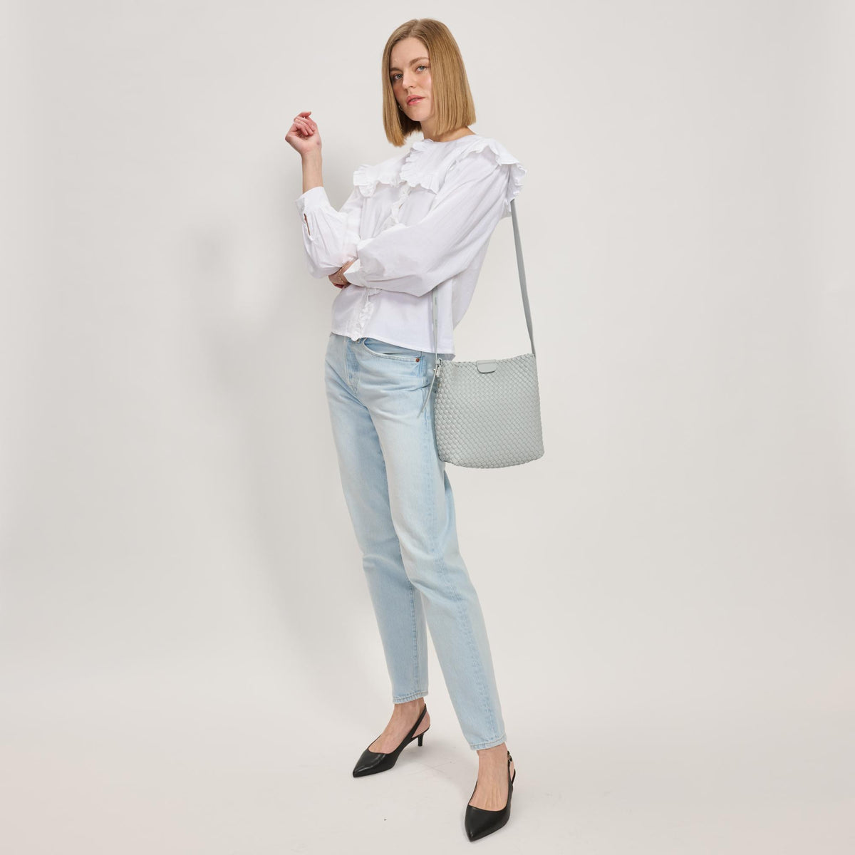 Woman wearing Ice Blue Moda Luxe Isadora Bucket 842017137344 View 3 | Ice Blue