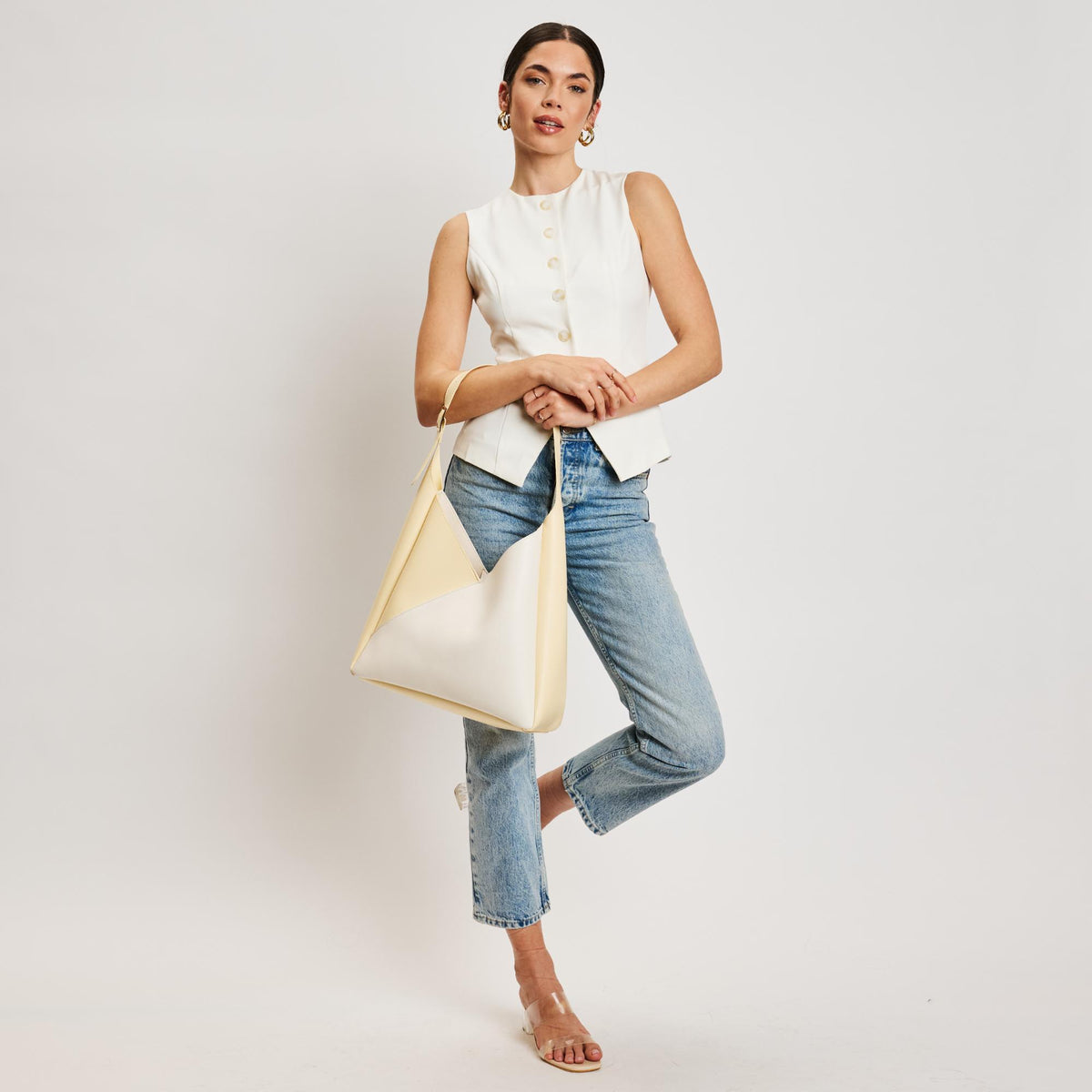 Woman wearing Ivory Butter Moda Luxe Frankie Hobo 842017138549 View 4 | Ivory Butter