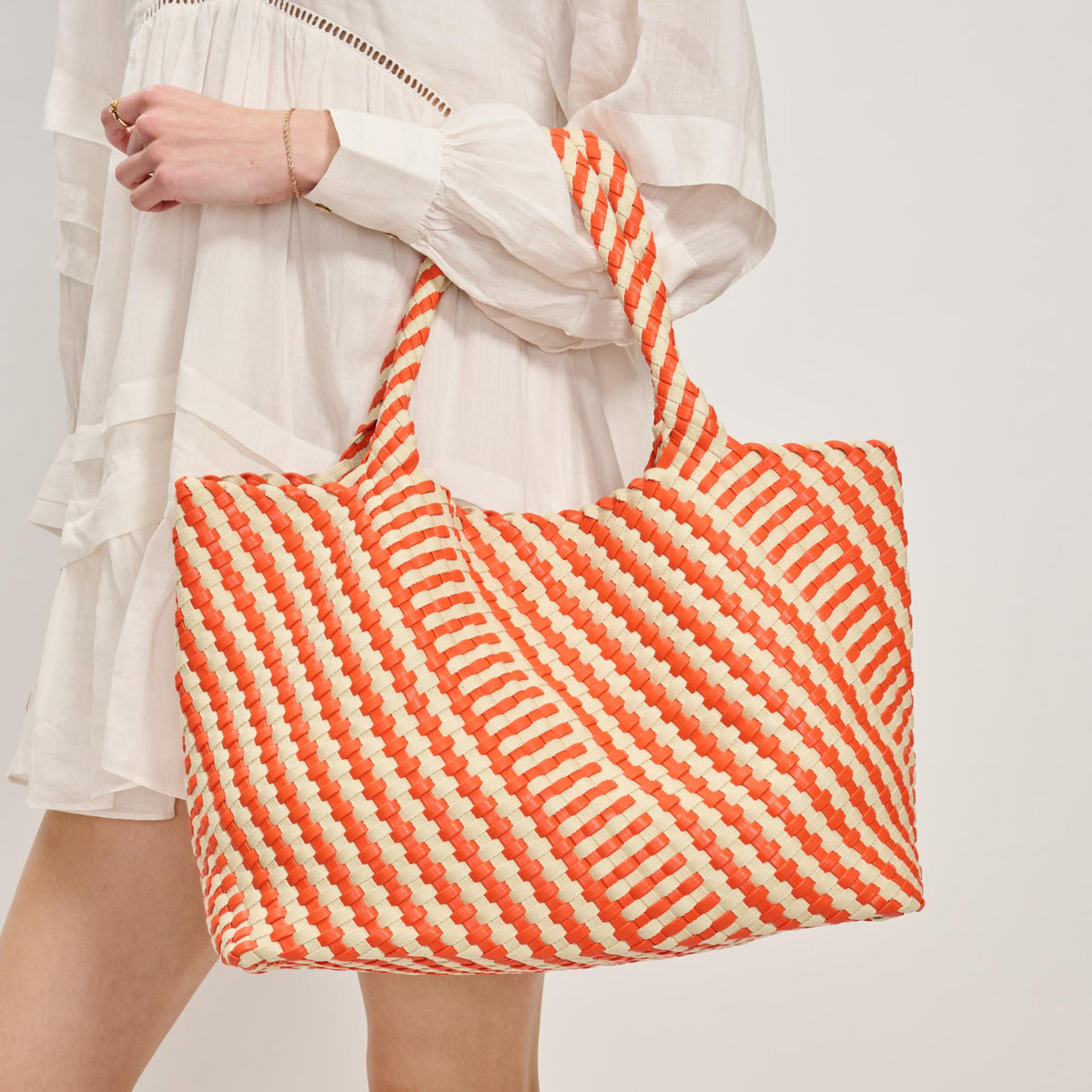 Woman wearing Orange Ivory Moda Luxe Solana - Mixed Material Tote 842017138600 View 1 | Orange Ivory