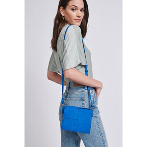 Woman wearing Electric Blue Moda Luxe Lena Crossbody 842017129479 View 2 | Electric Blue