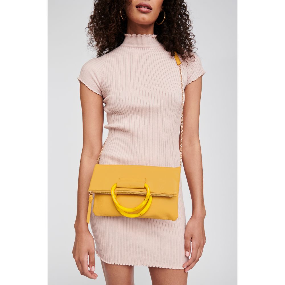 Woman wearing Mustard Moda Luxe Candice Clutch 842017120391 View 1 | Mustard