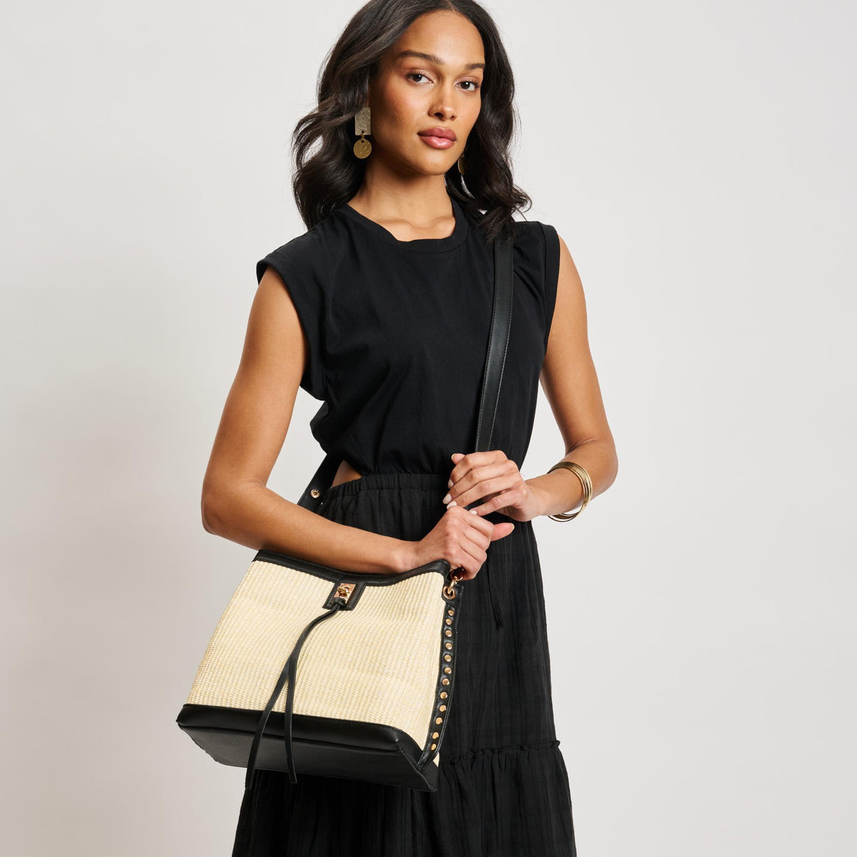 Woman wearing Ivory Black Moda Luxe Rina Shoulder Bag 842017138150 View 3 | Ivory Black