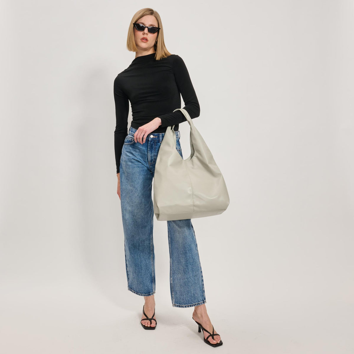 Woman wearing Bone Moda Luxe Faye Hobo 842017138778 View 2 | Bone