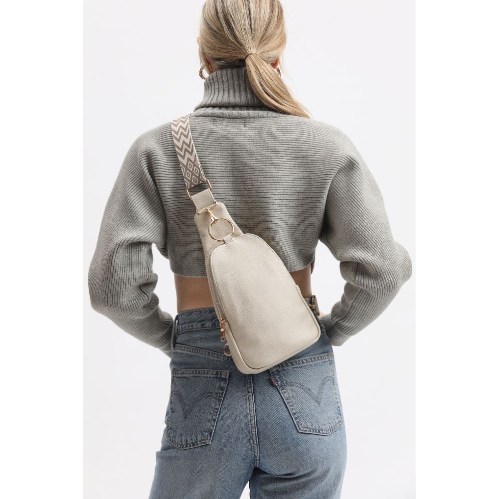 Woman wearing Cream Moda Luxe Regina Sling Backpack 842017133346 View 3 | Cream