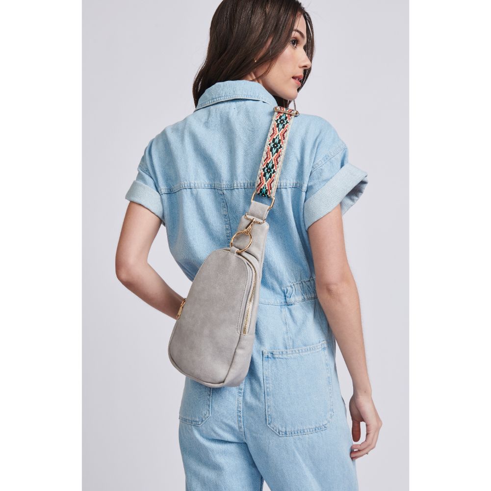 Woman wearing Grey Moda Luxe Regina Sling Backpack 842017129554 View 1 | Grey
