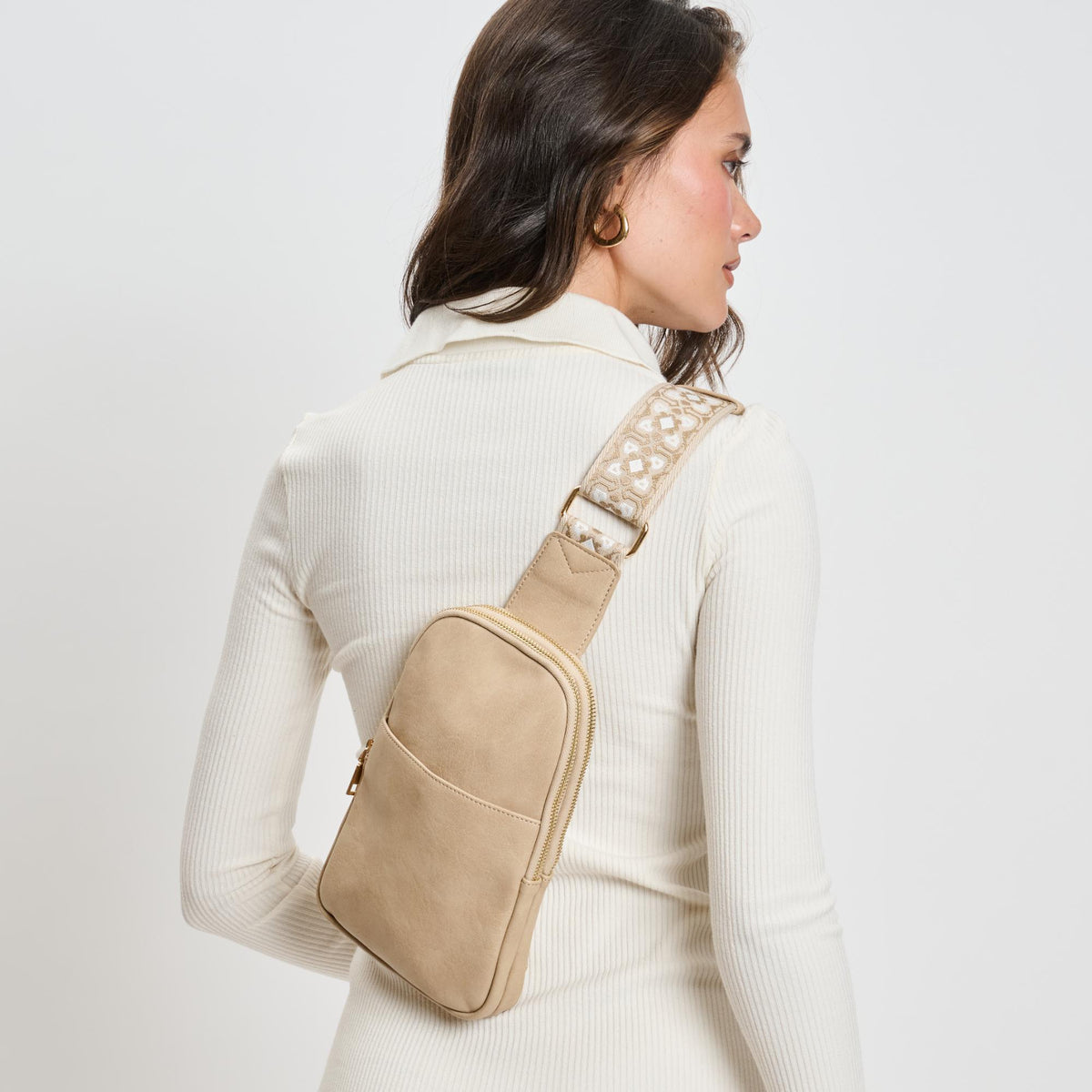 Woman wearing Natural Moda Luxe Zuri Sling Backpack 842017135852 View 2 | Natural