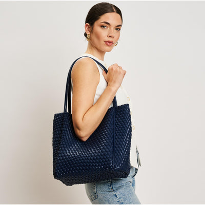 Woman wearing Navy Moda Luxe Gladys Tote 842017137276 View 1 | Navy