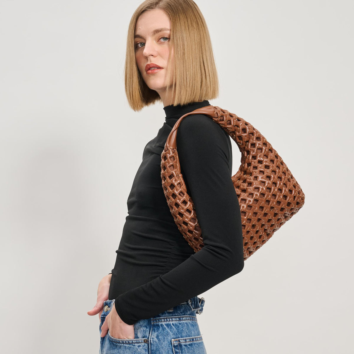 Woman wearing Chocolate Moda Luxe Richelle Hobo 842017137542 View 2 | Chocolate