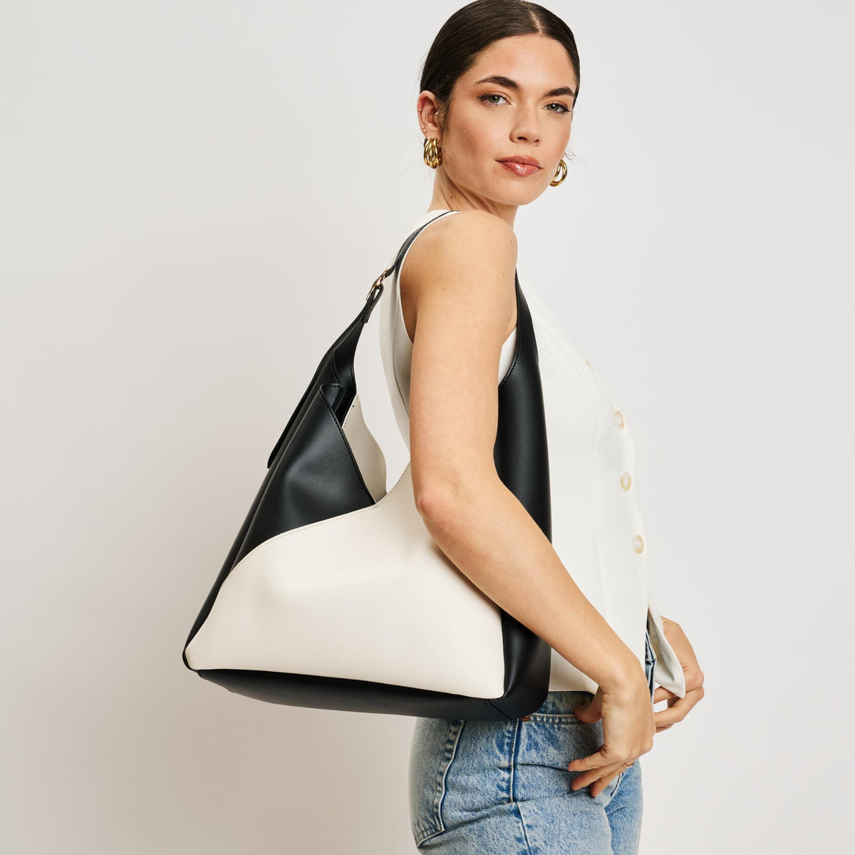 Woman wearing Ivory Black Moda Luxe Frankie Hobo 842017138518 View 2 | Ivory Black