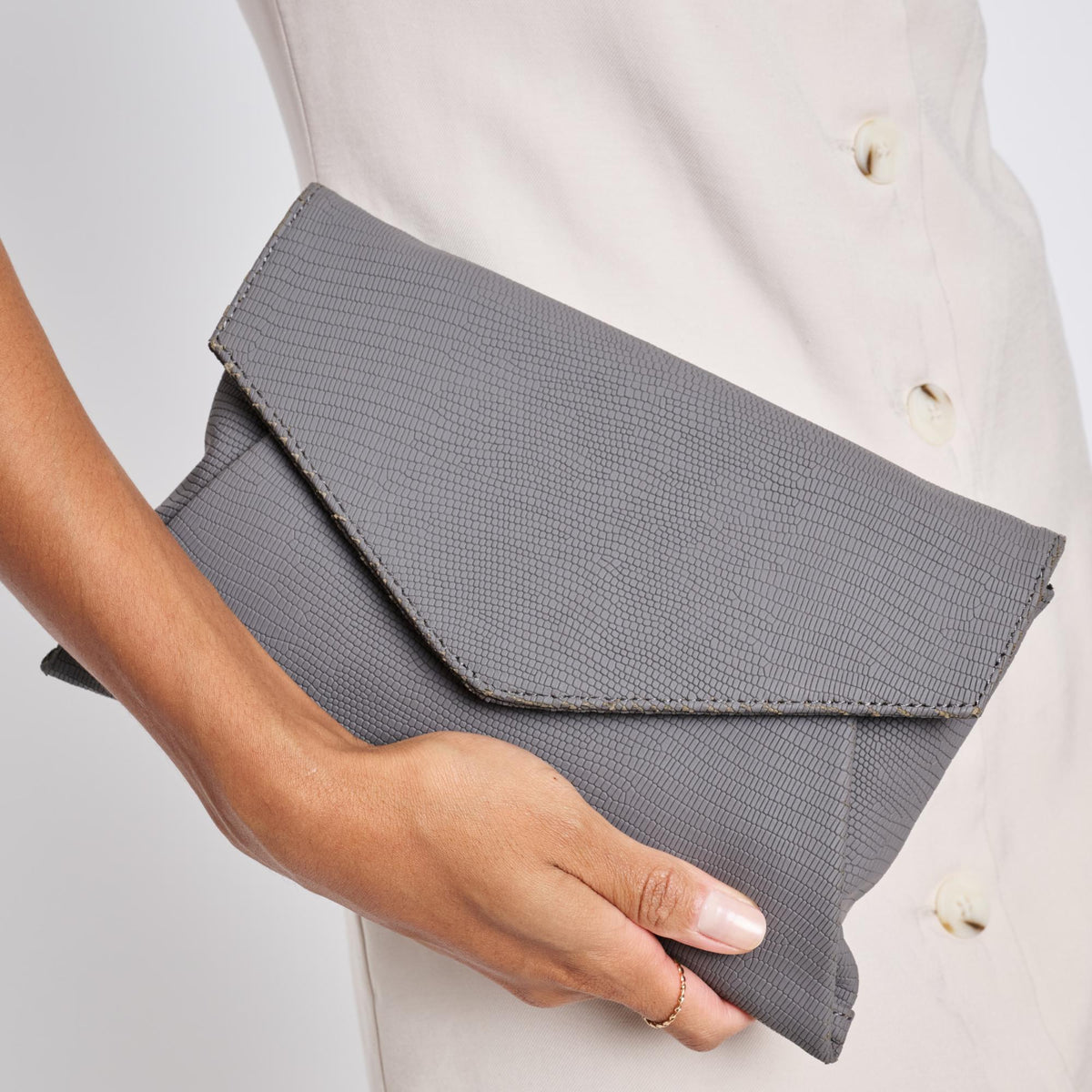 Woman wearing Grey Moda Luxe Cara Clutch 842017118190 View 1 | Grey