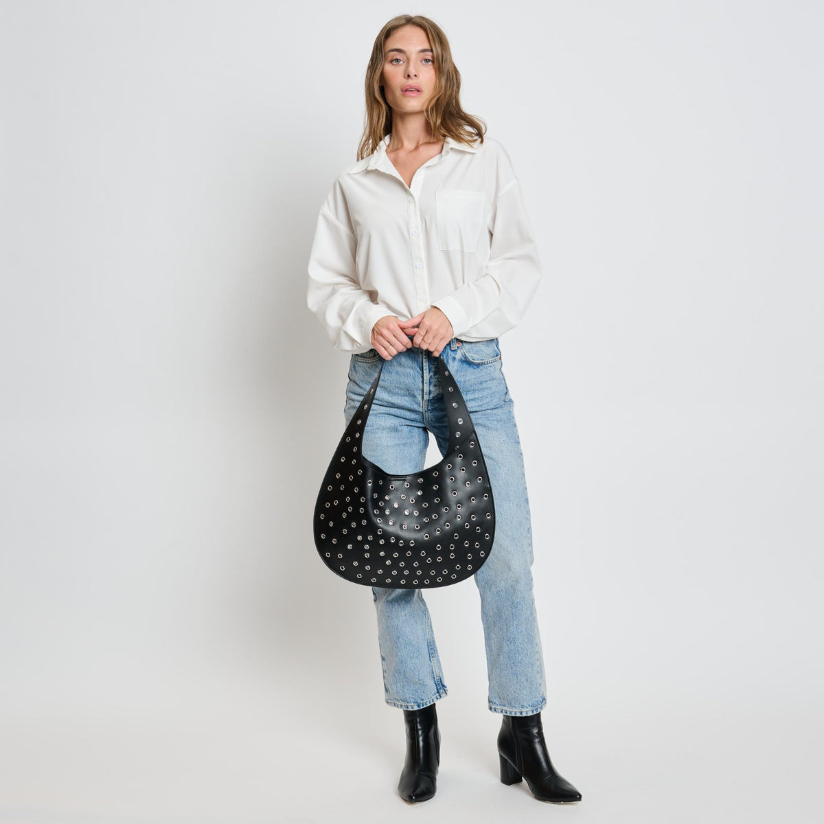 Woman wearing Black Moda Luxe Turner Hobo 842017136361 View 4 | Black