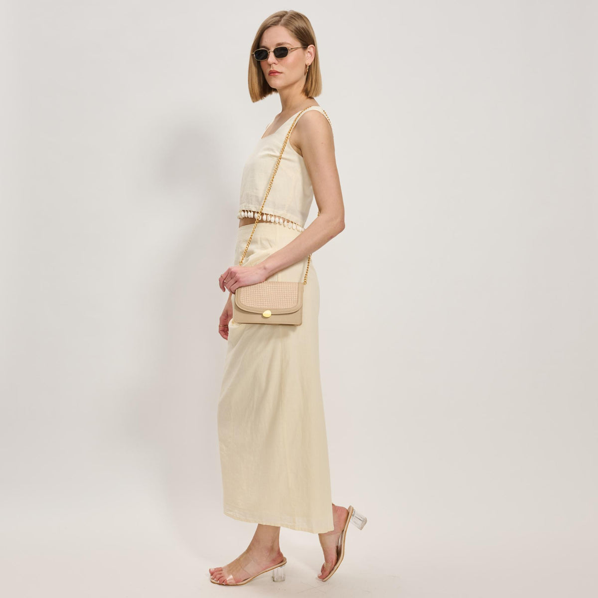 Woman wearing Cream Moda Luxe Nina Crossbody 842017137207 View 2 | Cream