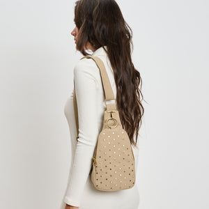 Woman wearing Natural Moda Luxe Regina Studded Sling Backpack 842017136828 View 2 | Natural