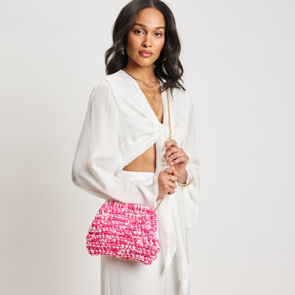 Woman wearing Hot Pink Moda Luxe Raya Clutch 842017138389 View 2 | Hot Pink