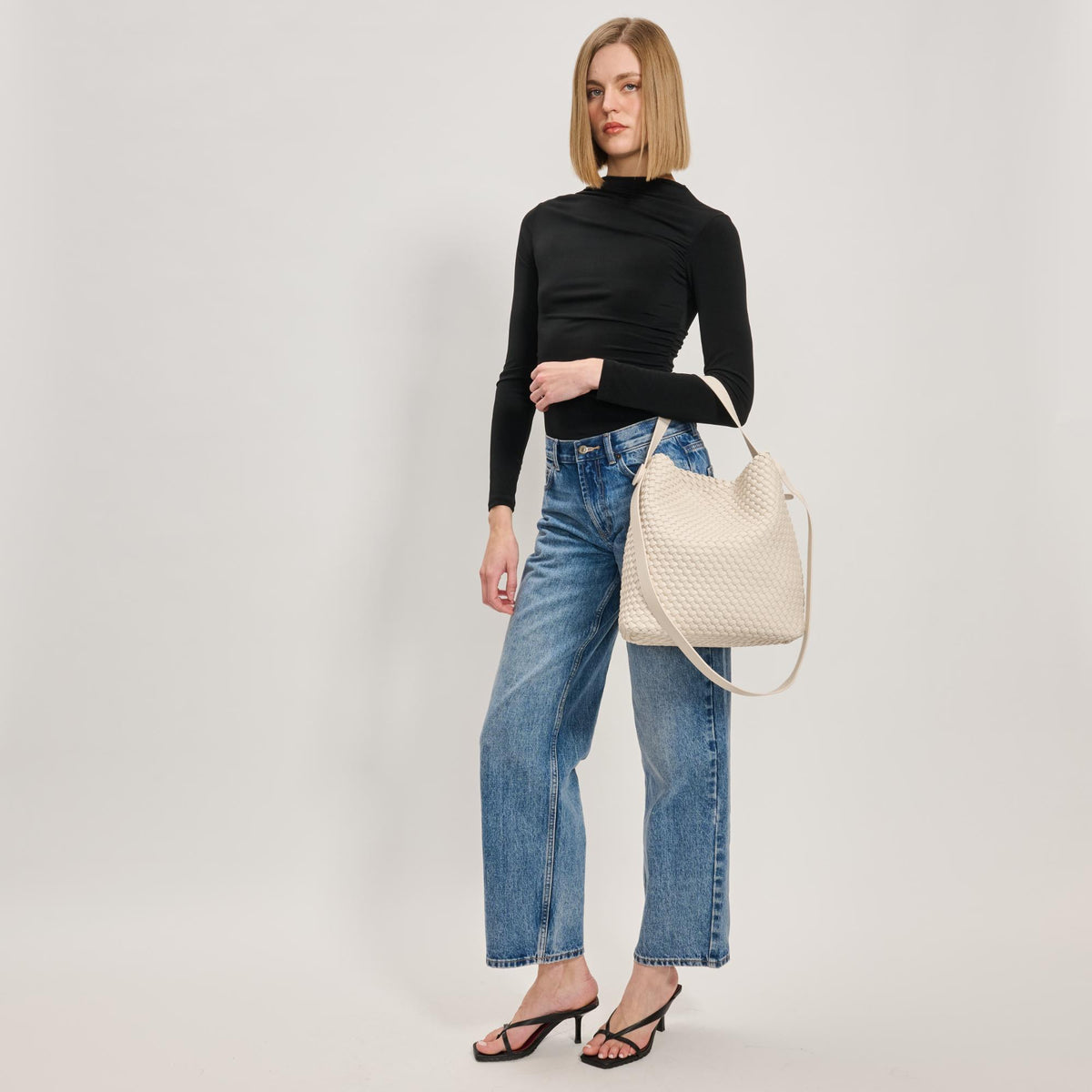 Woman wearing Oatmilk Moda Luxe Edith Hobo 842017137481 View 3 | Oatmilk