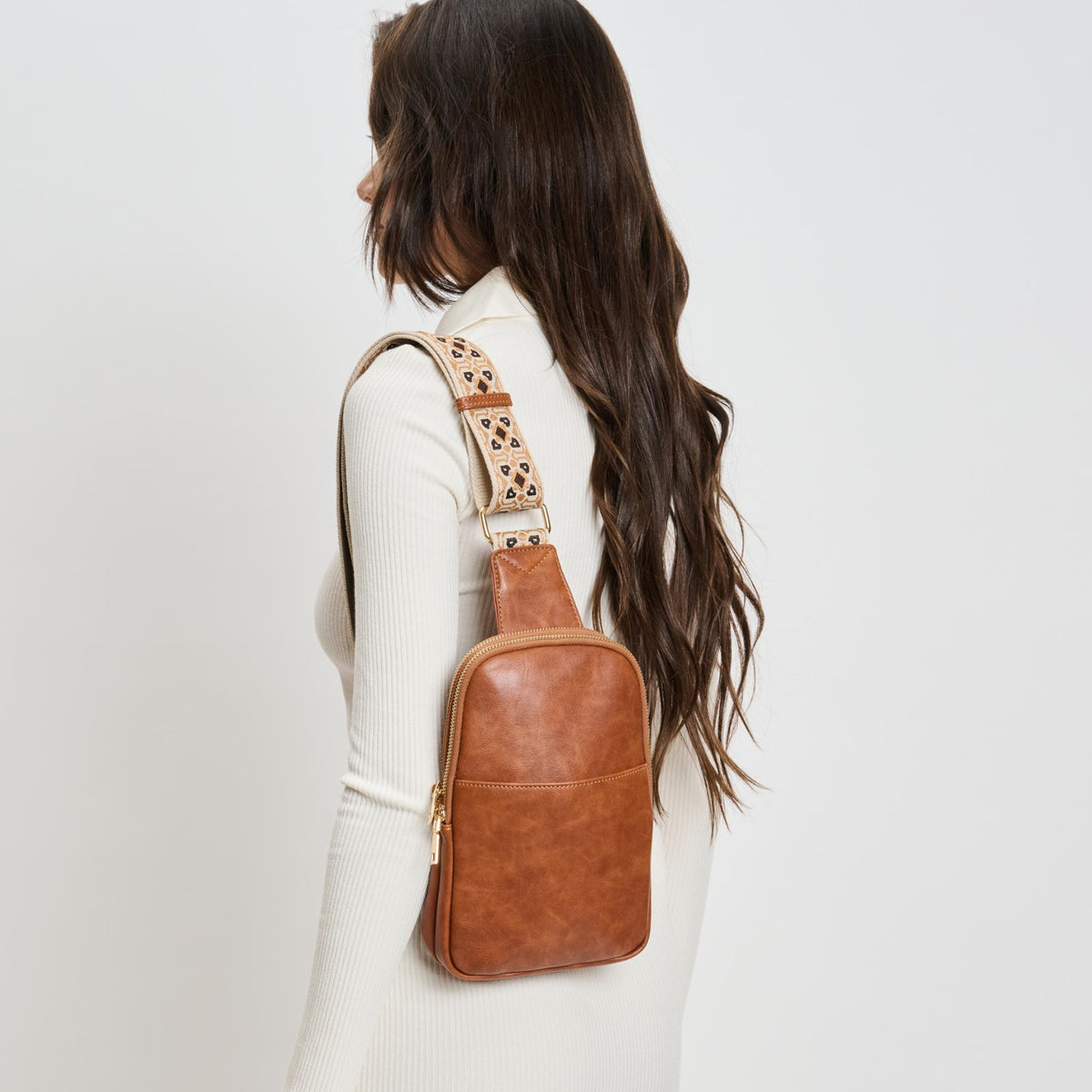 Woman wearing Tan Moda Luxe Zuri Sling Backpack 842017135845 View 2 | Tan