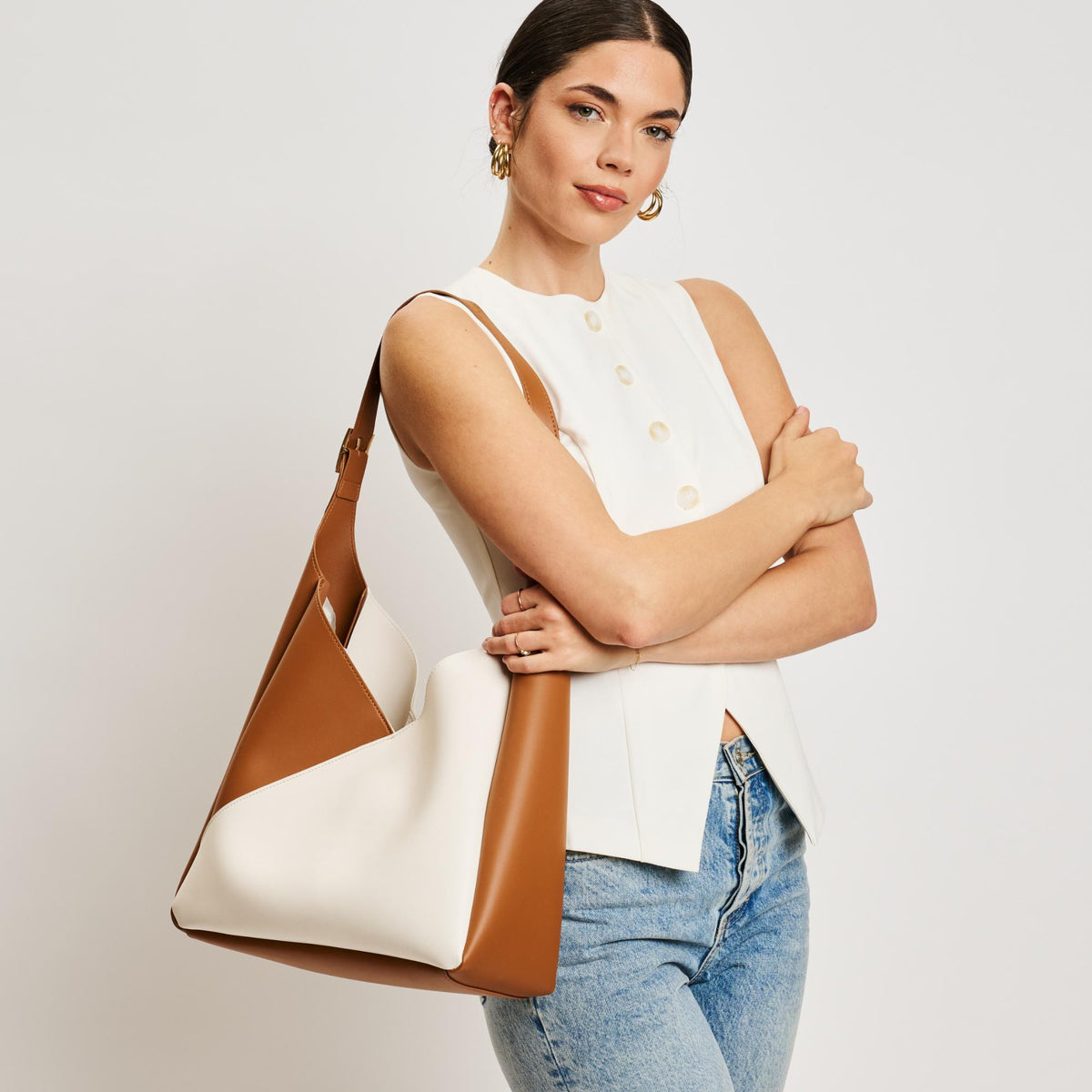 Woman wearing Ivory Tan Moda Luxe Frankie Hobo 842017138532 View 1 | Ivory Tan