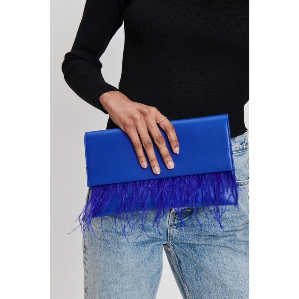 Woman wearing Electric Blue Moda Luxe Everlee Clutch 842017131144 View 1 | Electric Blue