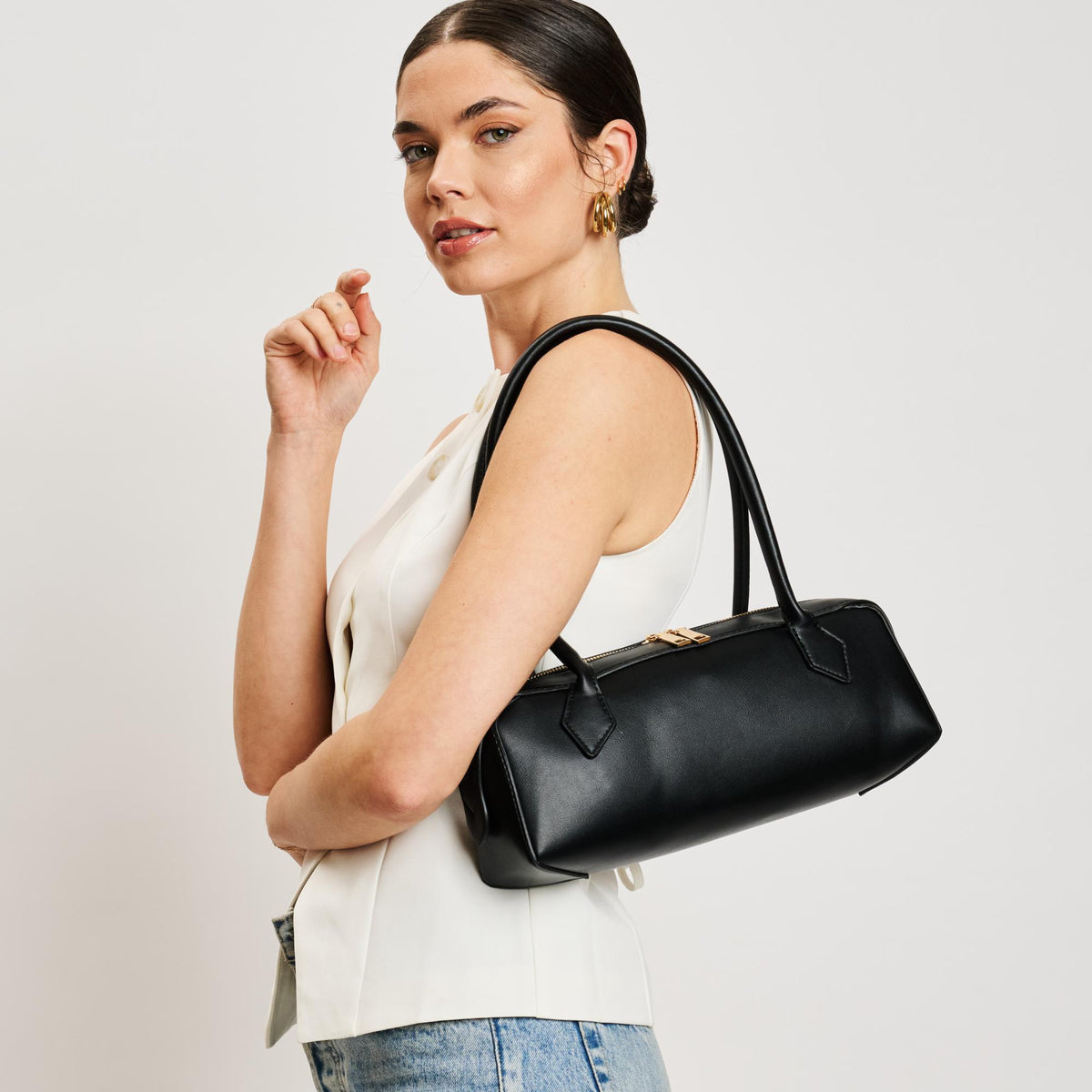 Woman wearing Black Moda Luxe Betty Shoulder Bag 842017138457 View 1 | Black