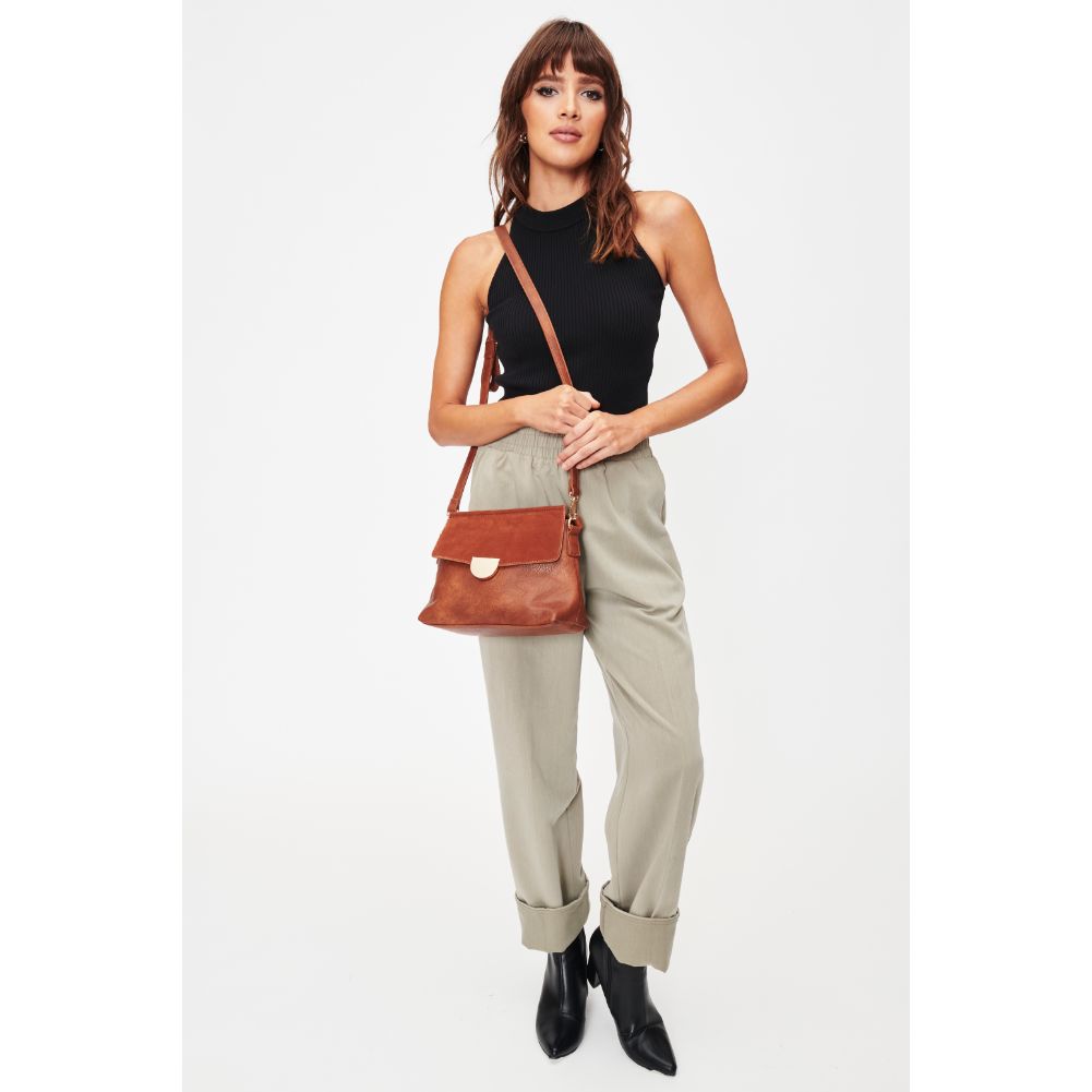 Woman wearing Cognac Moda Luxe Abby Crossbody 842017128625 View 3 | Cognac