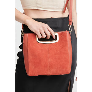 Woman wearing Rust Moda Luxe Brielle Crossbody 842017123040 View 1 | Rust