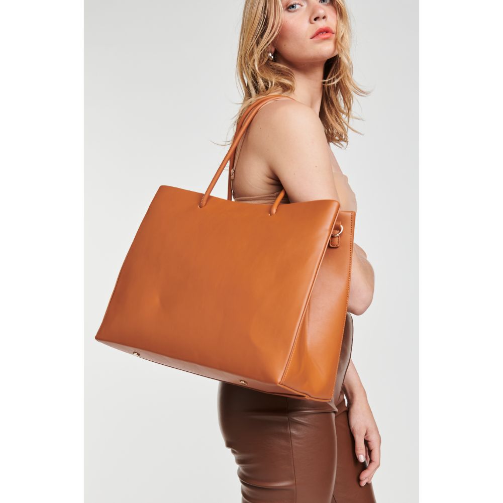 Woman wearing Tan Moda Luxe Pierce Tote 842017125044 View 4 | Tan