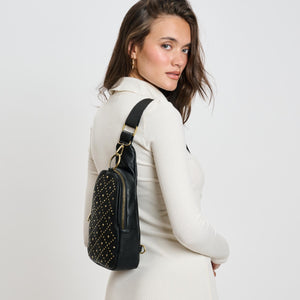 Woman wearing Black Moda Luxe Regina Studded Sling Backpack 842017136804 View 3 | Black