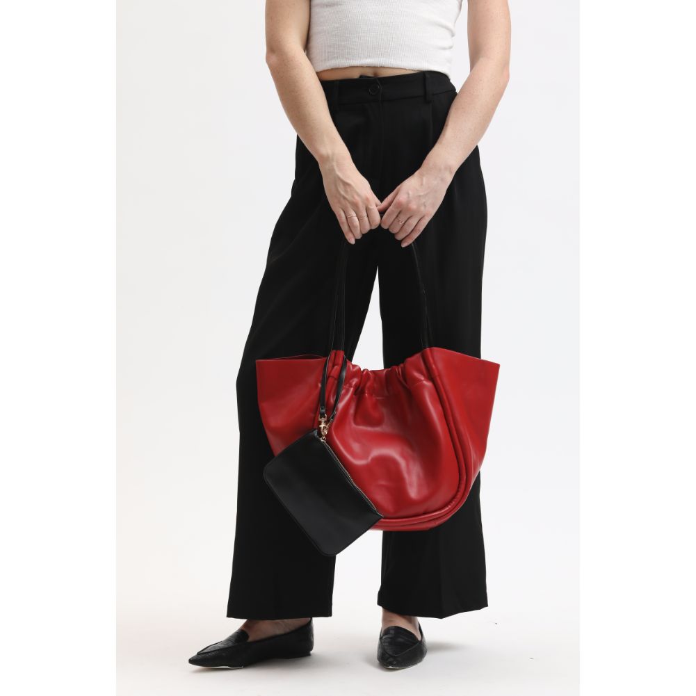 Woman wearing Red Moda Luxe Aaliyah Tote 842017133193 View 4 | Red