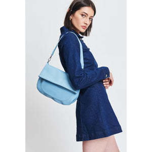 Woman wearing Sky Blue Moda Luxe Blake Crossbody 842017132691 View 1 | Sky Blue