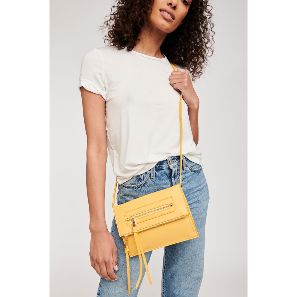 Woman wearing Yellow Moda Luxe Ellie Crossbody 842017113256 View 1 | Yellow