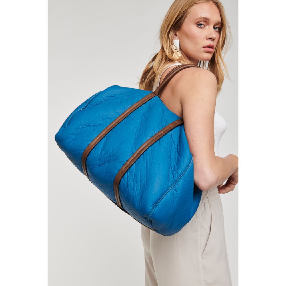 Woman wearing Blue Moda Luxe Canyon Weekender 842017101406 View 3 | Blue