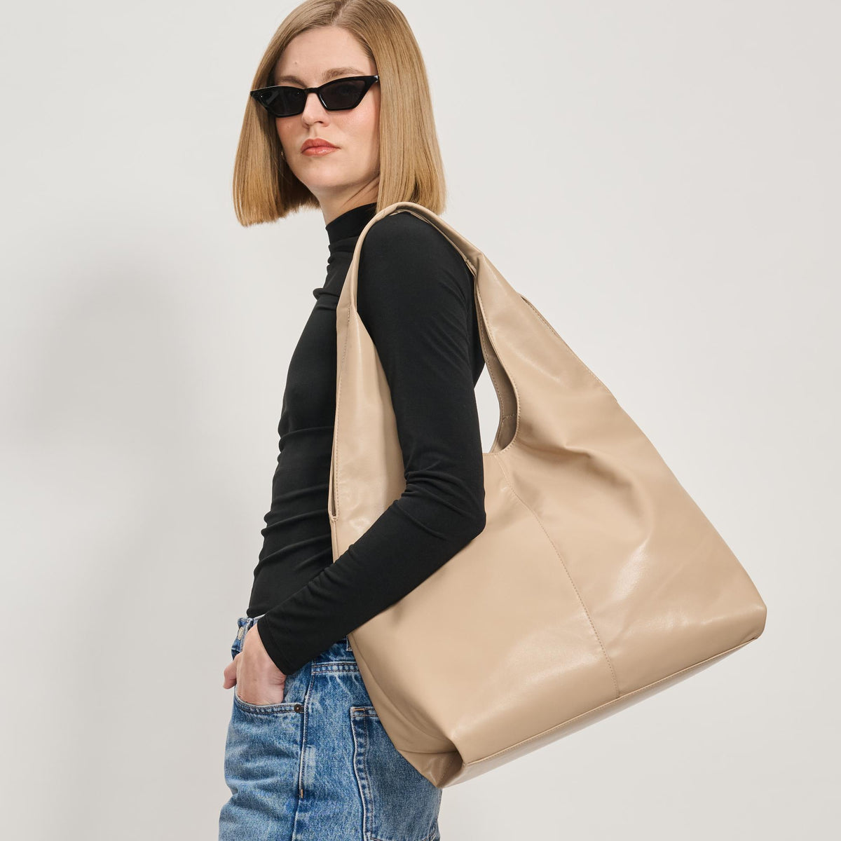 Woman wearing Natural Moda Luxe Faye Hobo 842017138761 View 1 | Natural