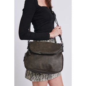 Woman wearing Charcoal Moda Luxe Dandelion Crossbody 819248012382 View 1 | Charcoal